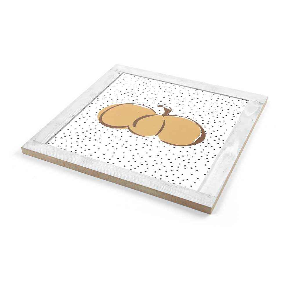 Pumpkin tablet with polka dot background