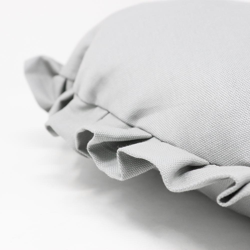 Heart cushion with gray ruffles